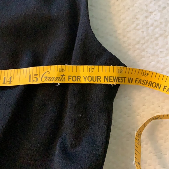 Simple black gown with embellished center. - Picture 5 of 7